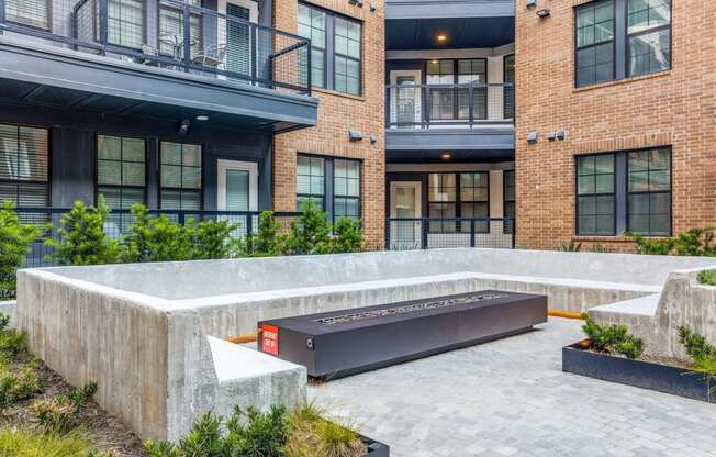 Cozy Fire Pit Area for Evening Gatherings and Relaxation at St. Elmo Apartment in Austin, TX