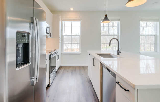 Kitchen with Stainless Steel Appliances and Light Cabinets