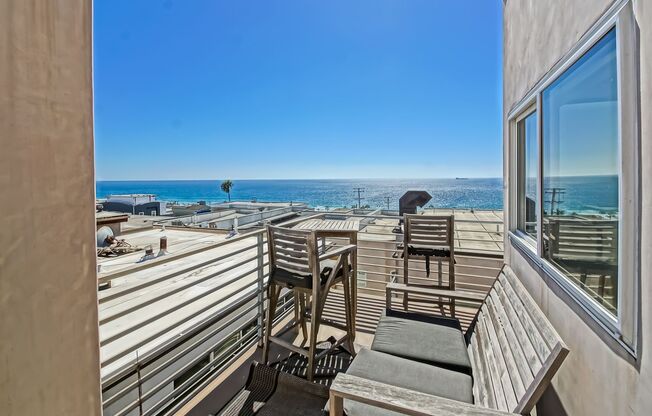 MODERN, BRIGHT & SPACIOUS, TRI-LEVEL DETACHED TOWNHOUSE W/ UNOBSTRUCTED OCEAN VIEWS, 2 BALCONIES & 4-CAR PARKING CLOSE TO RESTAURANTS, SHOPPING, EASY FREEWAY ACCESS & JUST 2 BLOCKS TO BEACH!