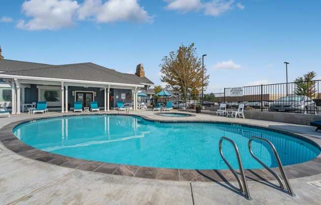 Regency Park Pool with Lounge Chairs