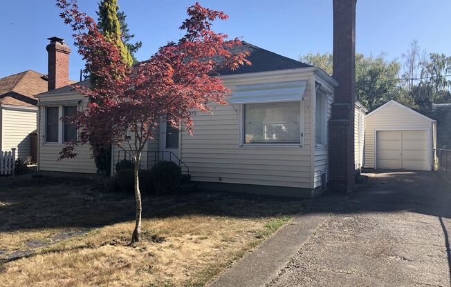 Spacious North Portland 6 Bedroom Home with Finished Basement, Modern Kitchen & Detached Garage