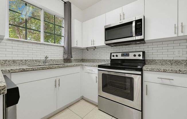 Modern 3 BR / 2 BA Condo in Gated Caribbean Isles – Available Now!
