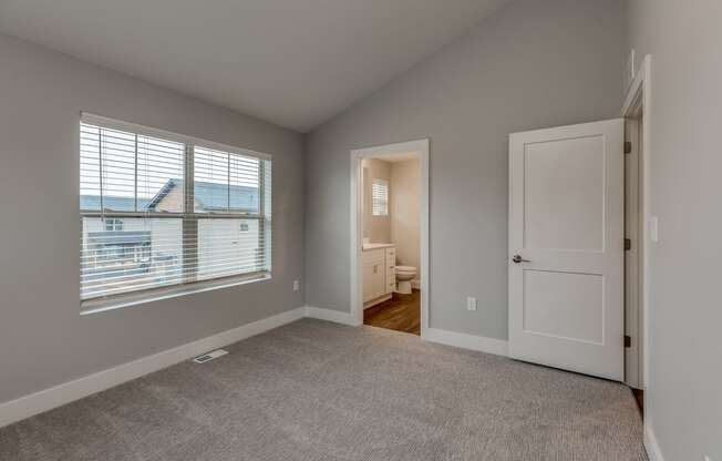 Bedroom at the Quarry Apartments in DeWitt Michigan