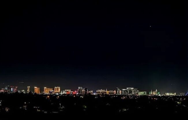 Unique condo with rooftop Strip Views and modern amenities.