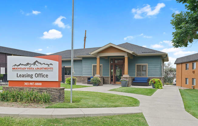 A leasing office for Mountain Vista Apartments is shown with a sign in front of the building at Mountain Vista Apartments, Colorado, 80228
