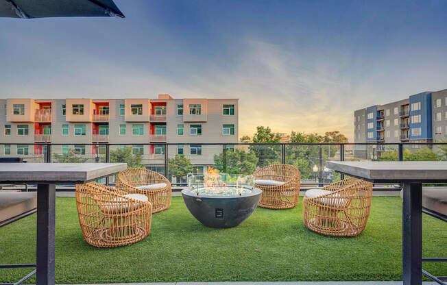 a view of a balcony with a fire pit