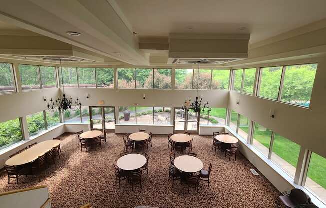 community room with tables and chairs