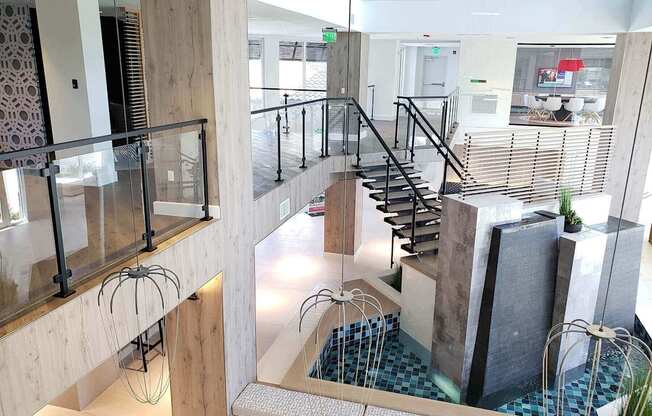 Multi-story clubhouse with beautiful stone fountain