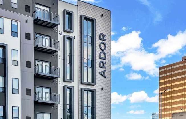 A modern building with the word ARDOR on the side.
