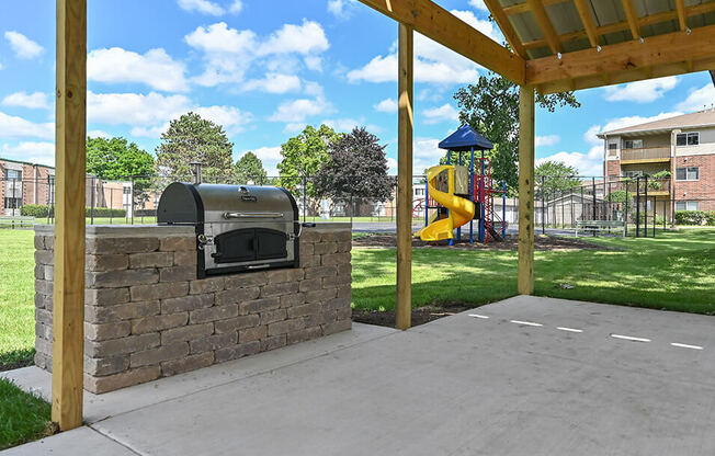 apartment complex with Grilling and Picnic Area