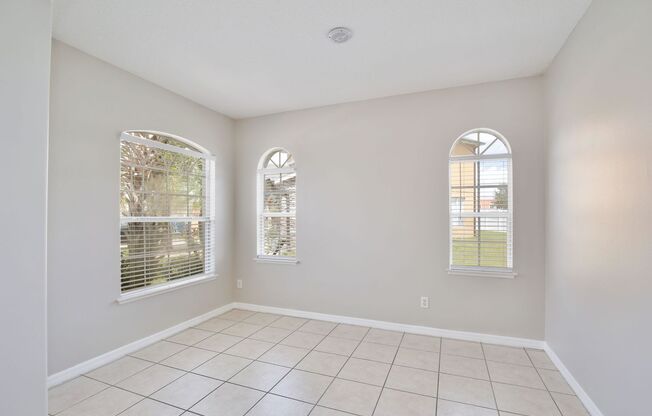 Gorgeous 4/2.5 Home with a 2 Car Garage Located in the Gated Community of Huntcliff Park at Meadow Woods - Orlando!