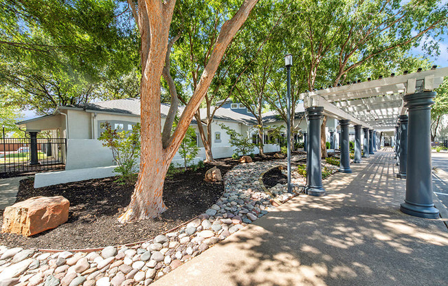 Exterior Community Building and Landscape at Allure North Dallas Apartments in Dallas, TX.
