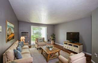 a living room with a couch and a television