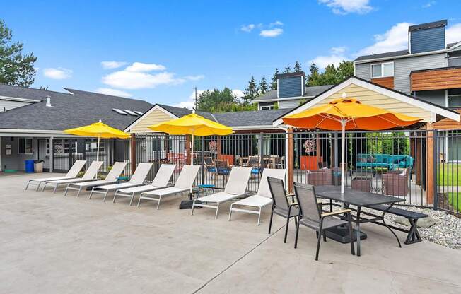 A sunny day at the outdoor seating area of a restaurant. at Northpoint Apartments, Tacoma, WA
