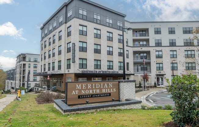 A large building with a sign that says Meridian at North Hills.