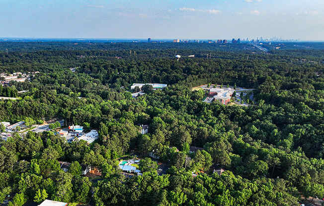 arial view of Veridian with the Atlanta
 skyline in the background