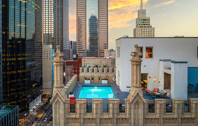 A building with a pool in the middle of it.