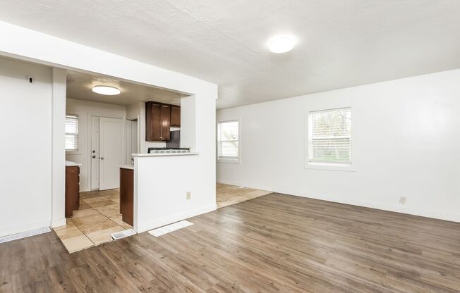 Spacious 4 Bed, 2 Bath Pet-Friendly Home with Central Air & Garage! - Available NOW!