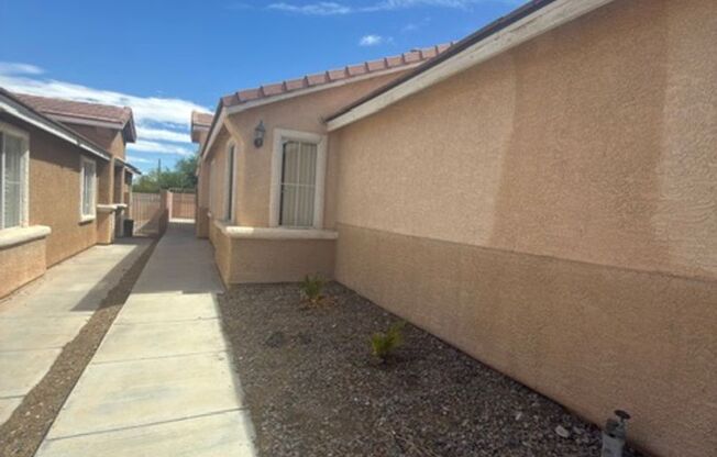 Welcome to this inviting 3-bedroom, 2-bathroom single-story home located in the desirable Rhodes Ranch area!