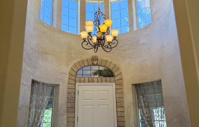 7000 square foot, 6 bedroom, 5 1/2 bath executive home located within gated community of Meadow Ranch