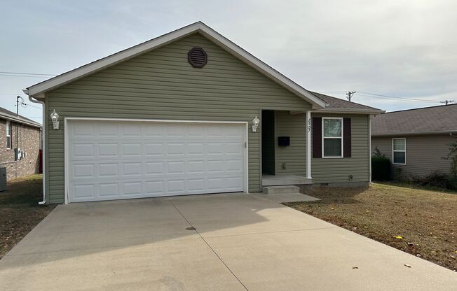 Adorable home with 3 bedrooms, 2 bathrooms located in Joplin! Attached two car garage and a must see!