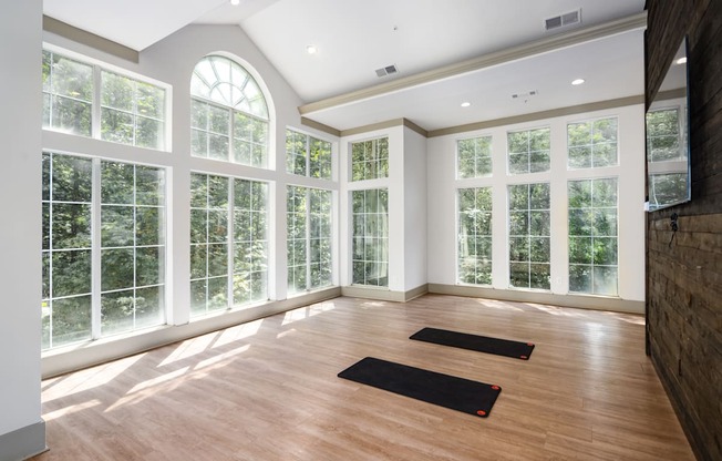 Yoga studio with TV and big beautiful windows