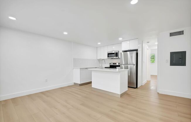 Brand New 2023 Renovated Building! 1 Bd/1 Ba, quartz countertops, washer/dryer, stainless steel appliances, 1 parking space.