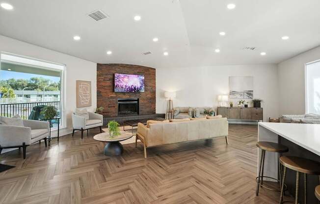 A living room with a fireplace and a television.