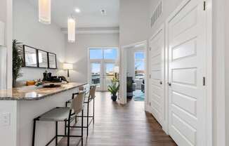 The Edison at Bozeman Gateway Apartments in Bozeman, Montana Model Kitchen and View into Living Room and Bedroom