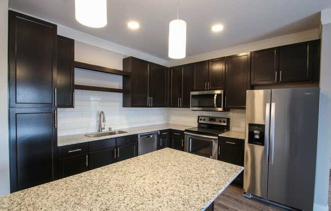 Granite Counter Tops Throughout at The Edison at Avonlea, Lakeville, 55044