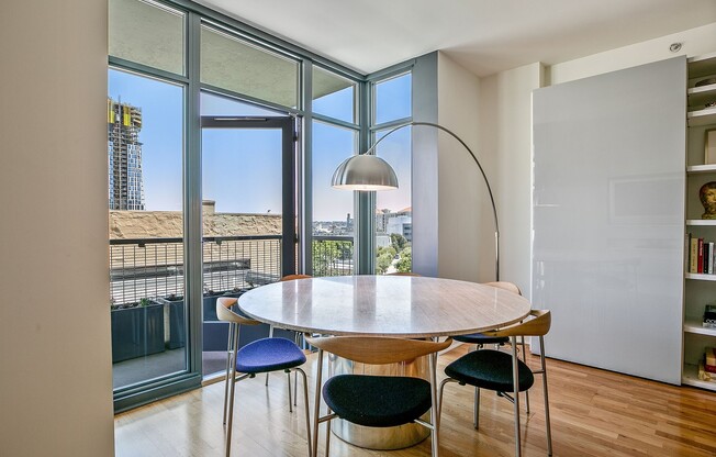 Gorgeous designer one bedroom in Hayes Valley w/lots of light, views, W/D, private patio, roof deck, gym and parking!