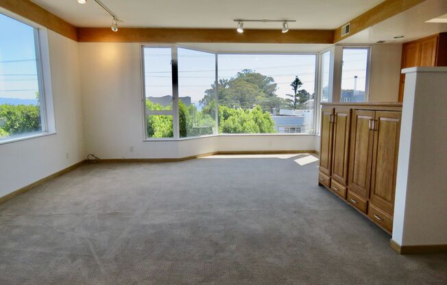 2 Story Condo with Parking, Views and Outdoor Space!