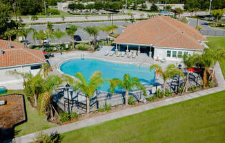 Aerial view of pool and clubhouse at Trillium apartments in Melbourne fl