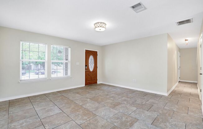 Two-Story Retreat with Modern Amenities and Convenient Access