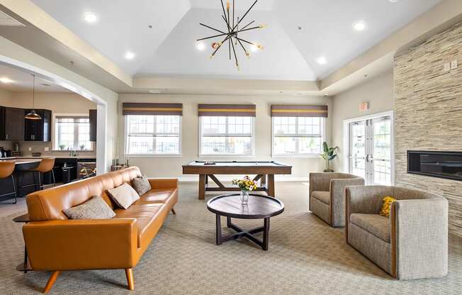 the preserve at ballantyne commons community living room with couches and tables