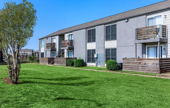 a large lawn in front of a house