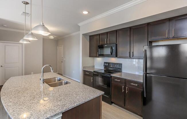 a modern kitchen with stainless steel appliances