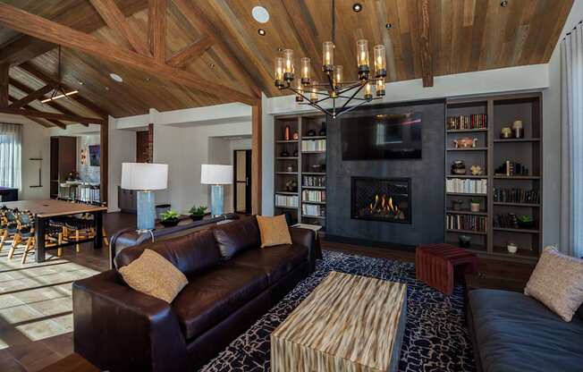 A living room with a fireplace and a couch.