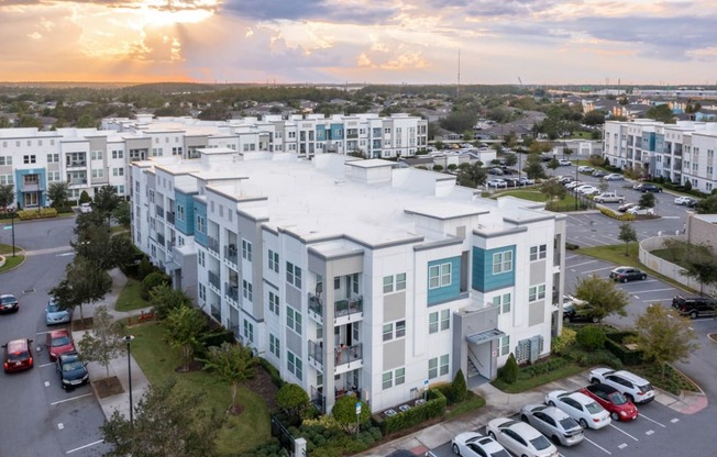 an aerial view of a building and a parking lot  at Linden on the GreeneWay, Orlando