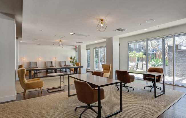 A conference room with a long table and chairs.