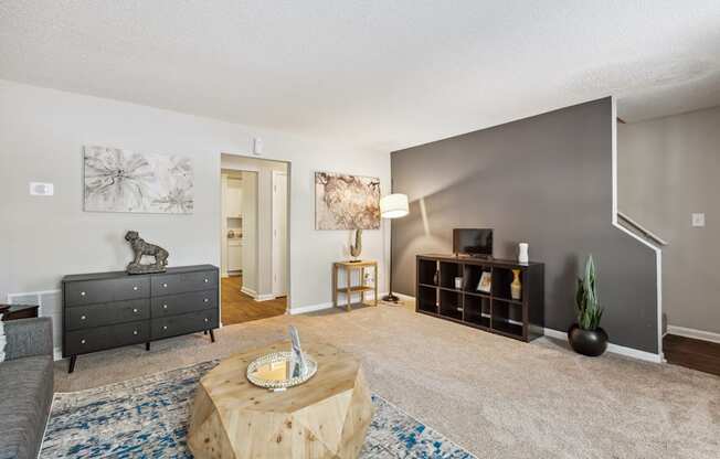 a living room with a couch and a coffee table
