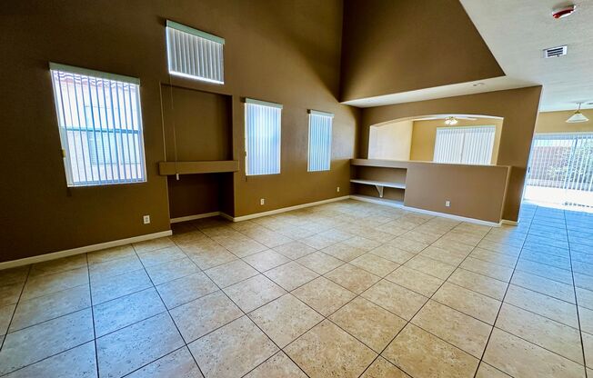 Spacious family home near Silverado Ranch park with 5 bedrooms and one bed & bath downstairs!