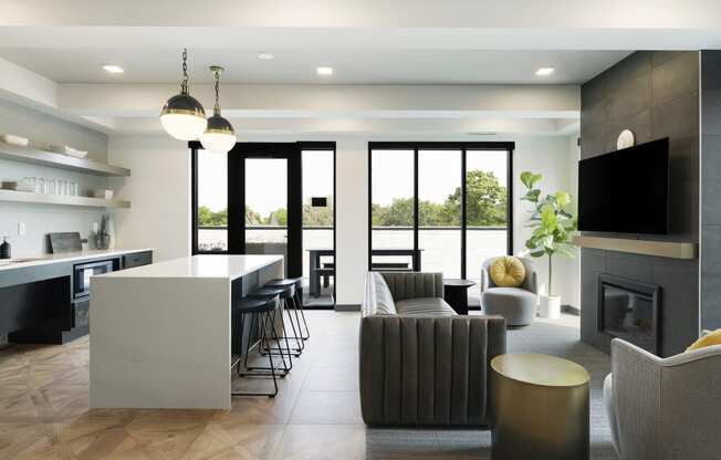 a living room with a fireplace and a table with chairs