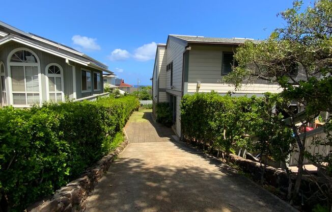 FULLY FURNISHED KAIMUKI 1 BEDROOM UNIT TUCKED AWAY IN BACK OF PROPERTY