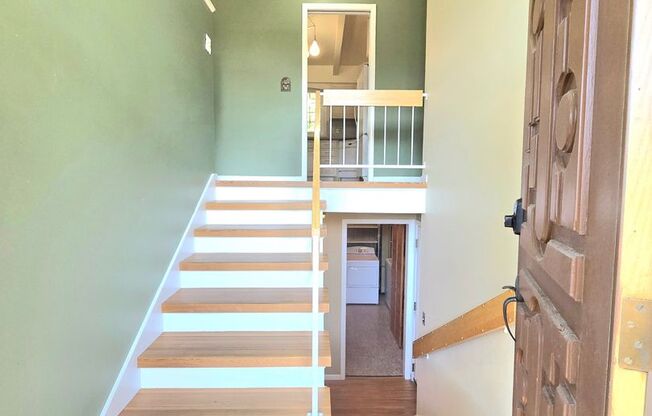 Charming 4-Bedroom Split-Level Home with Spacious Yard and Modern Comforts