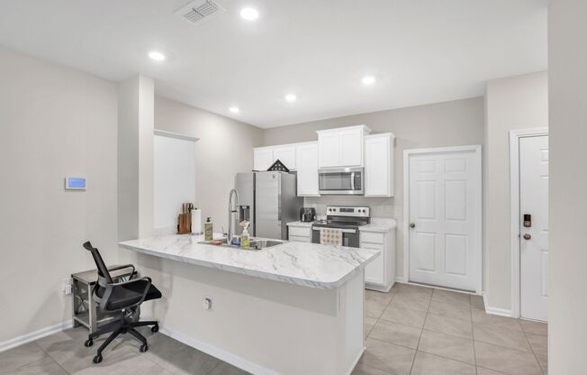 Like new 2 bedroom/ 2.5 bathroom with one car garage townhome in Nassau county!