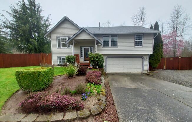 4 bedroom 2.75 bath, Huge Fenced Yard with Landscaping Included!!