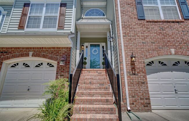 Available 10-21-24! Upgraded Tri-Level Townhome w/Garage!