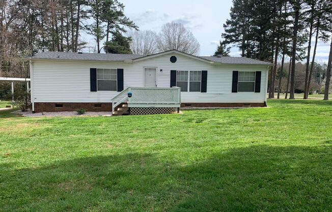 Spacious 3 Bed/2 Bath Home - Large Corner Lot - Split Floor Plan - 2 Car Carport - No Pets