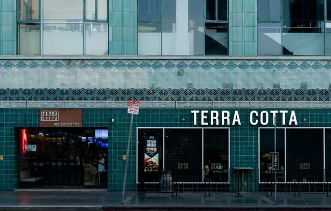 a store front with a sign that reads terra cotta